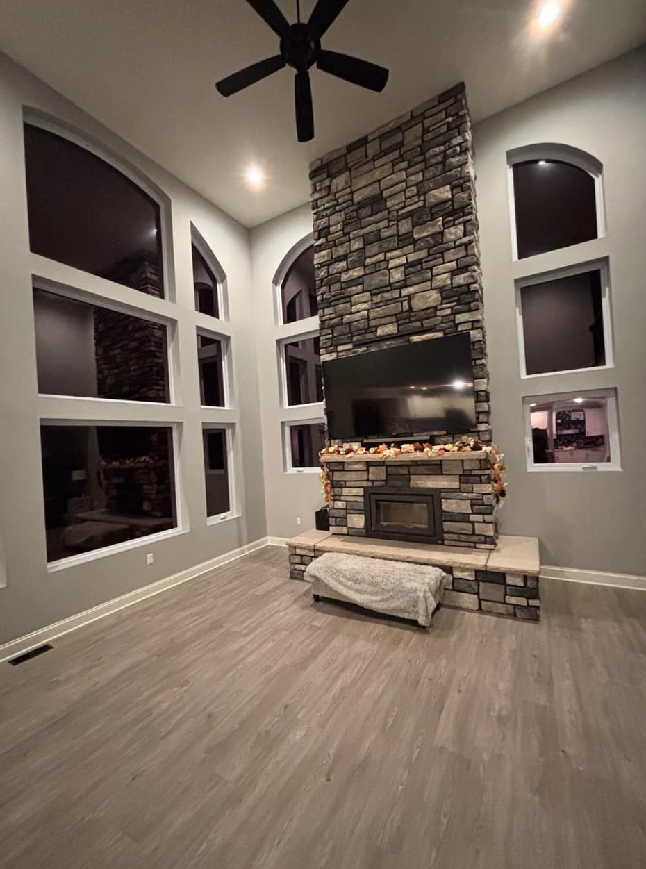 Sunlit living room featuring professionally installed window tinting by MINT Window Tint in Pittsburgh, PA